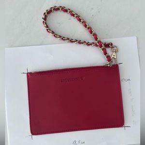 Love Moschino small bag, which can be used for a phone.  small pen marks.